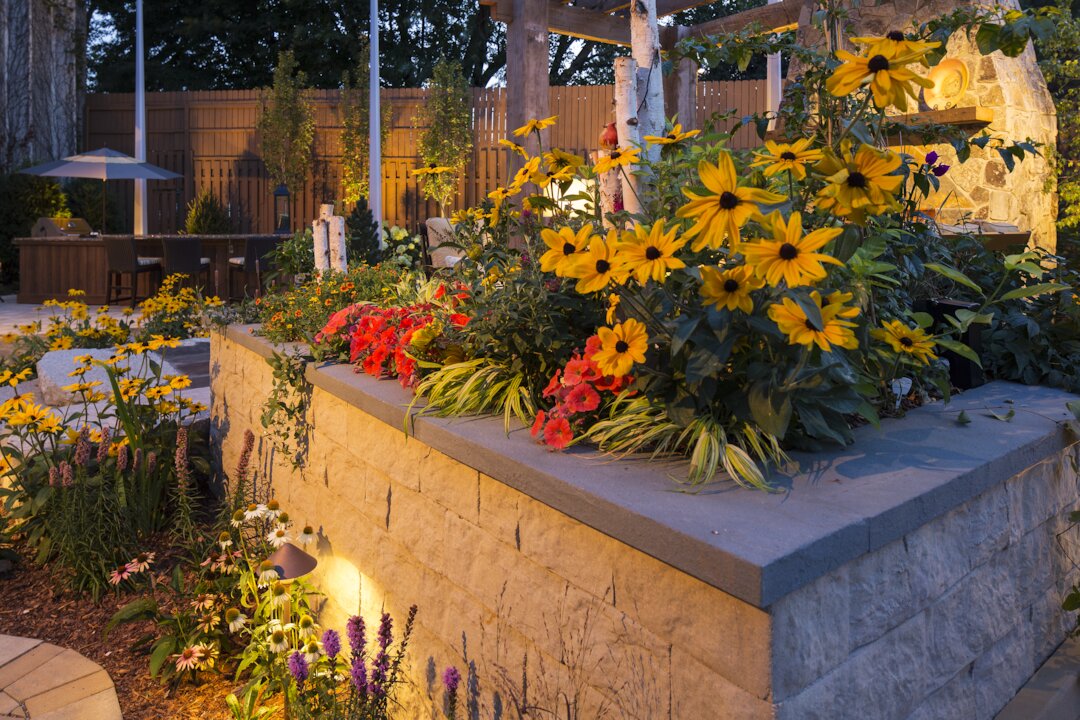 Vibrant garden with flowers and patio area