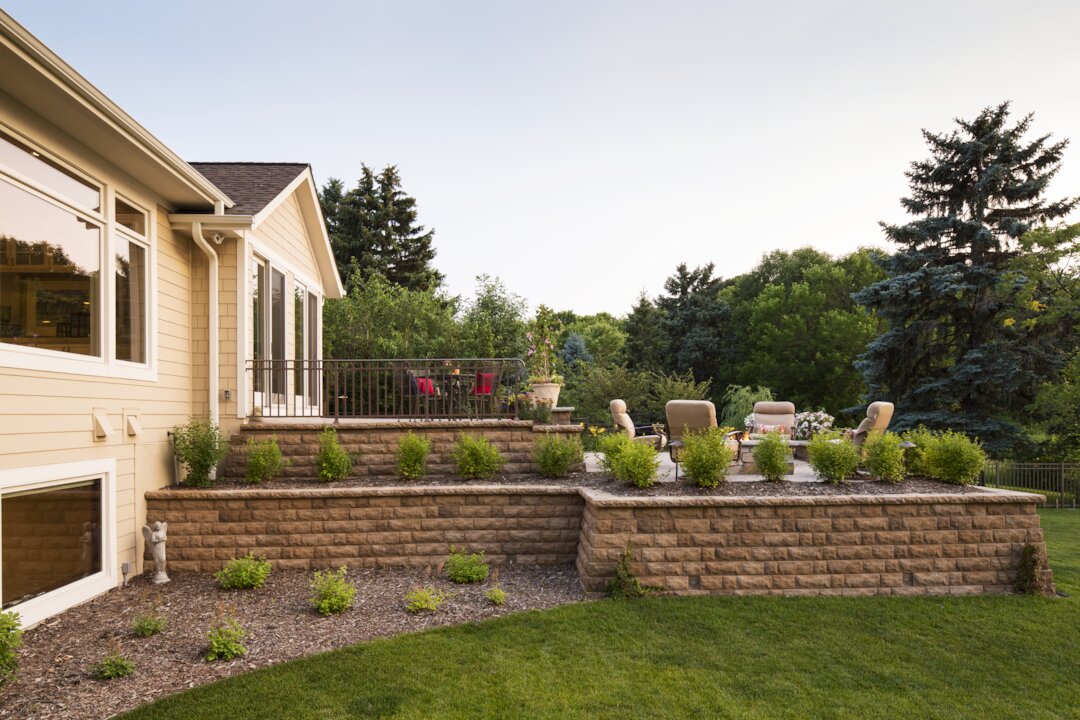 Elevated patio with garden and chairs