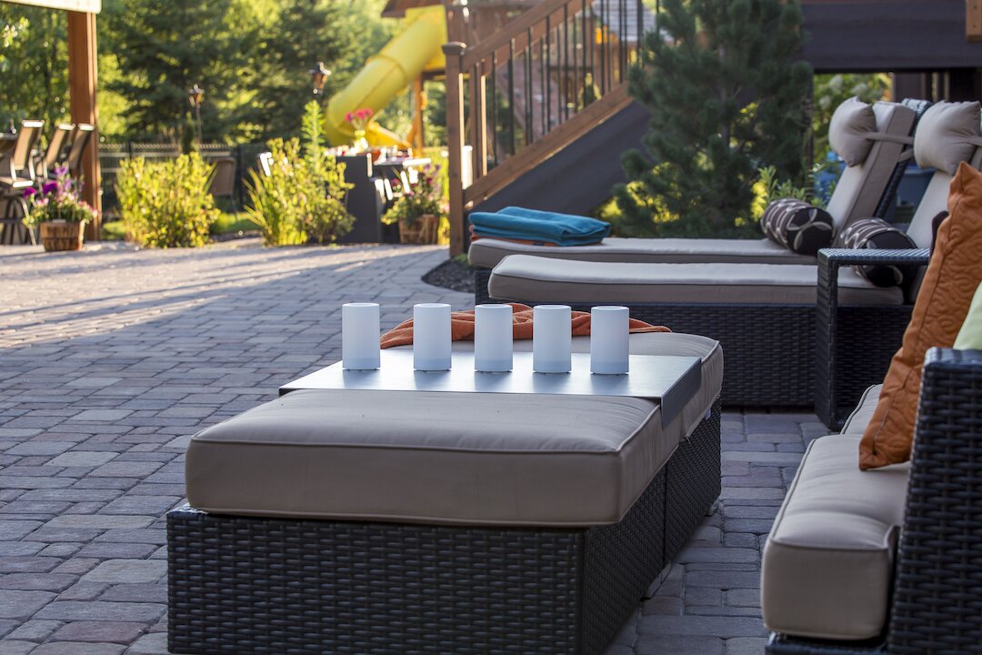 Outdoor patio with cushions and plants