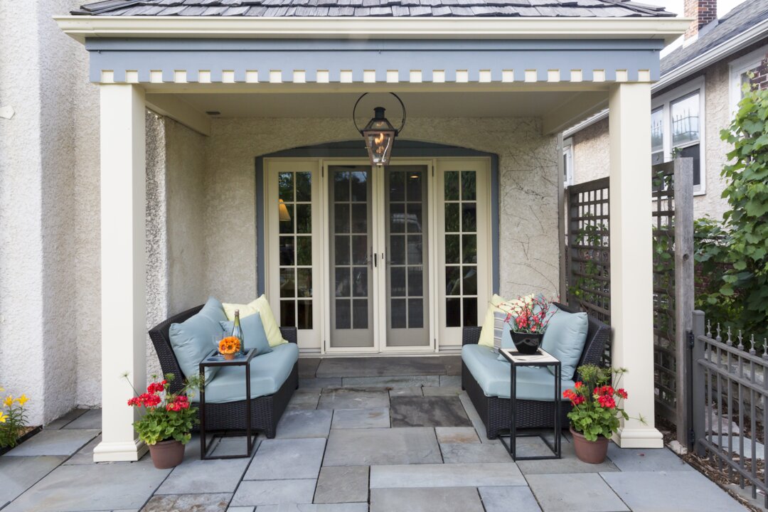 Cozy patio with seating and flowers
