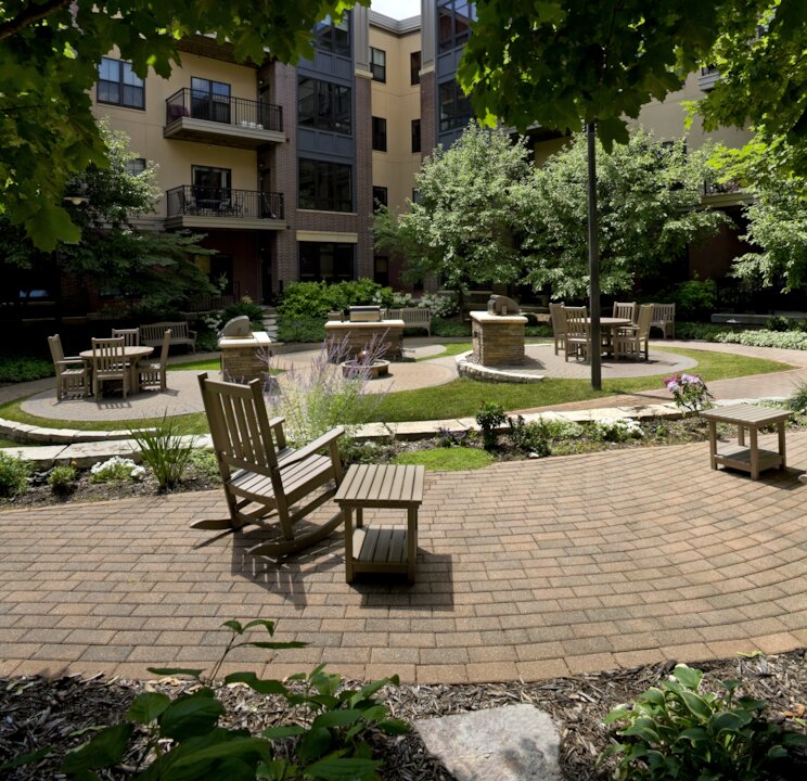 Lush courtyard with seating and gardens