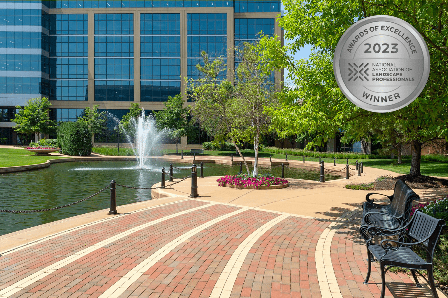 Award-winning landscaped park with fountain and benches.