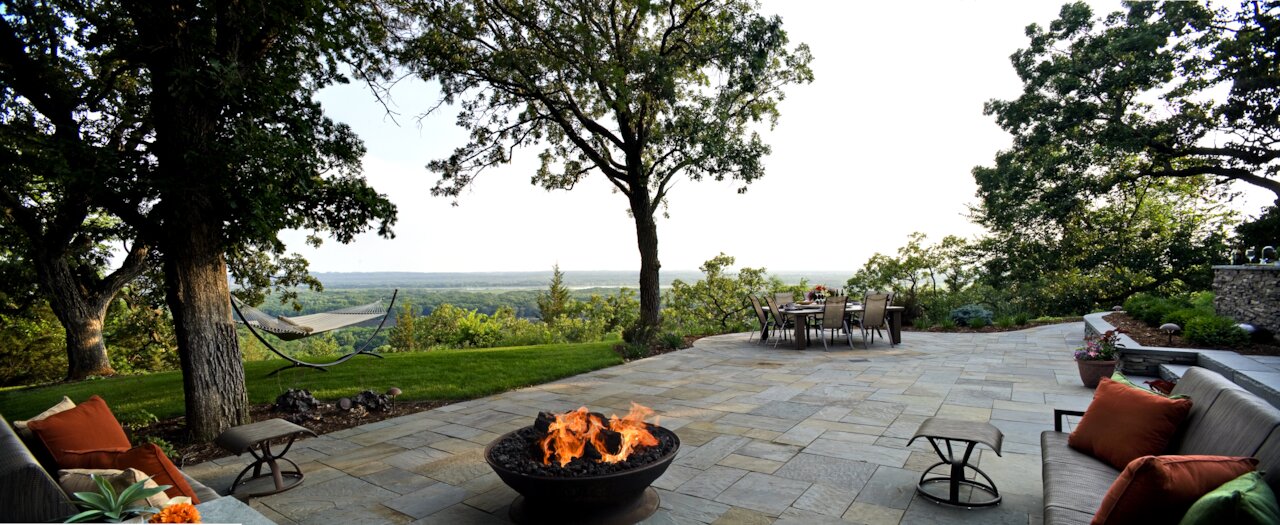 Patio with fire pit and scenic view