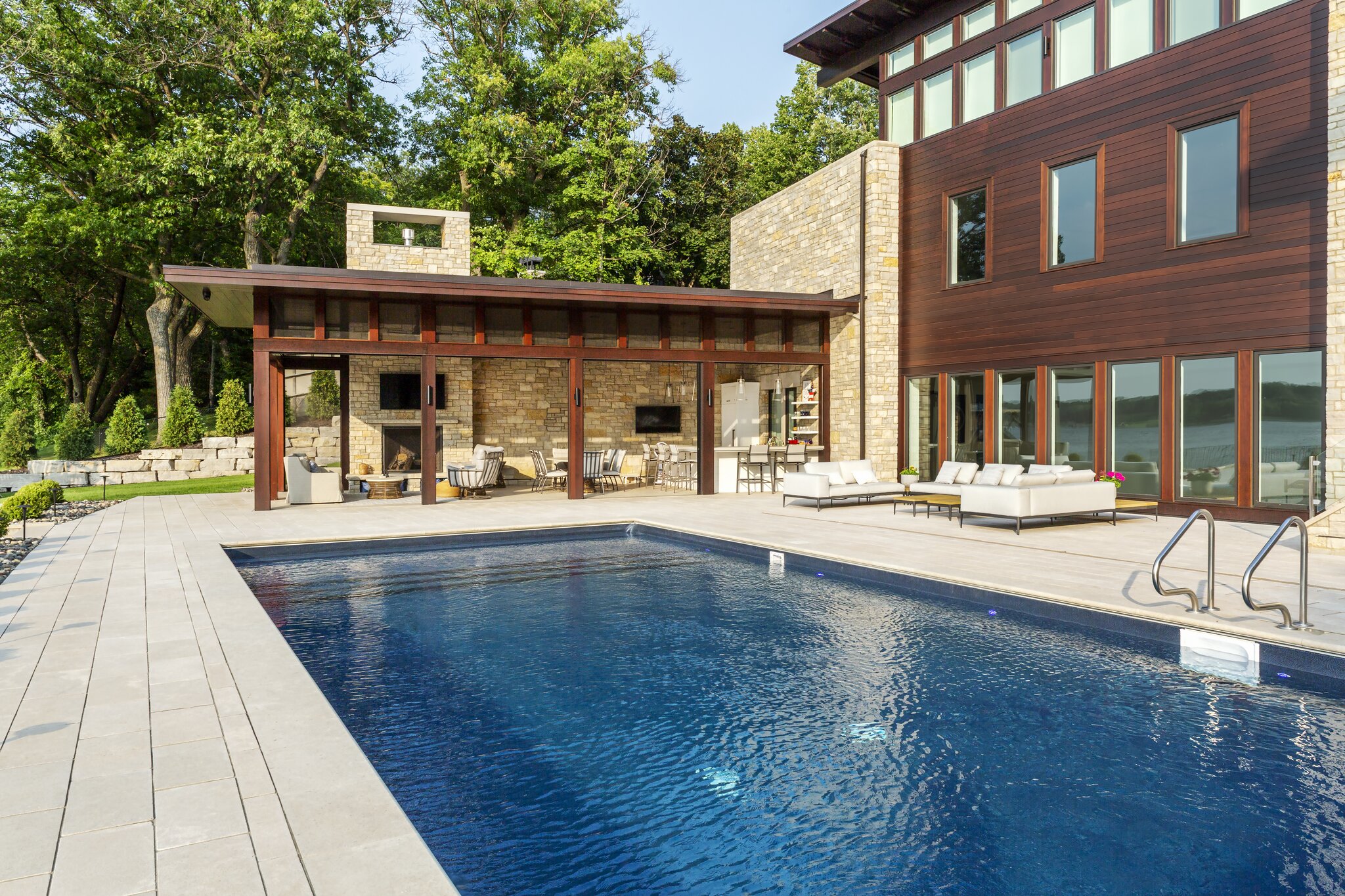 Luxury modern house with pool and patio.