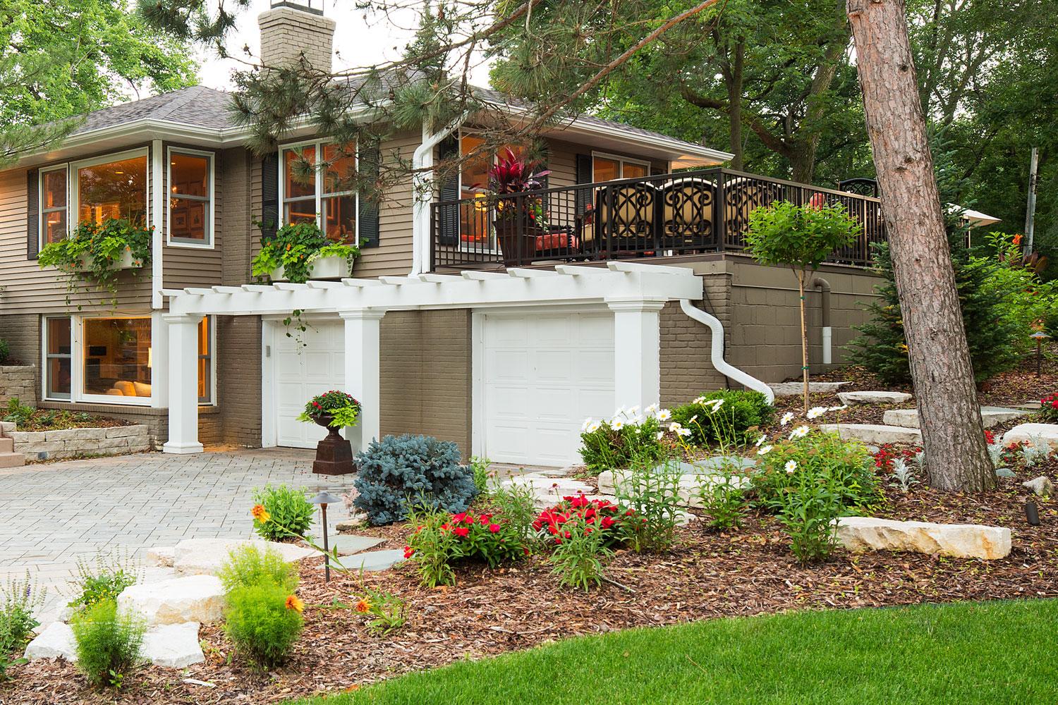 Beautiful house with lush garden landscaping