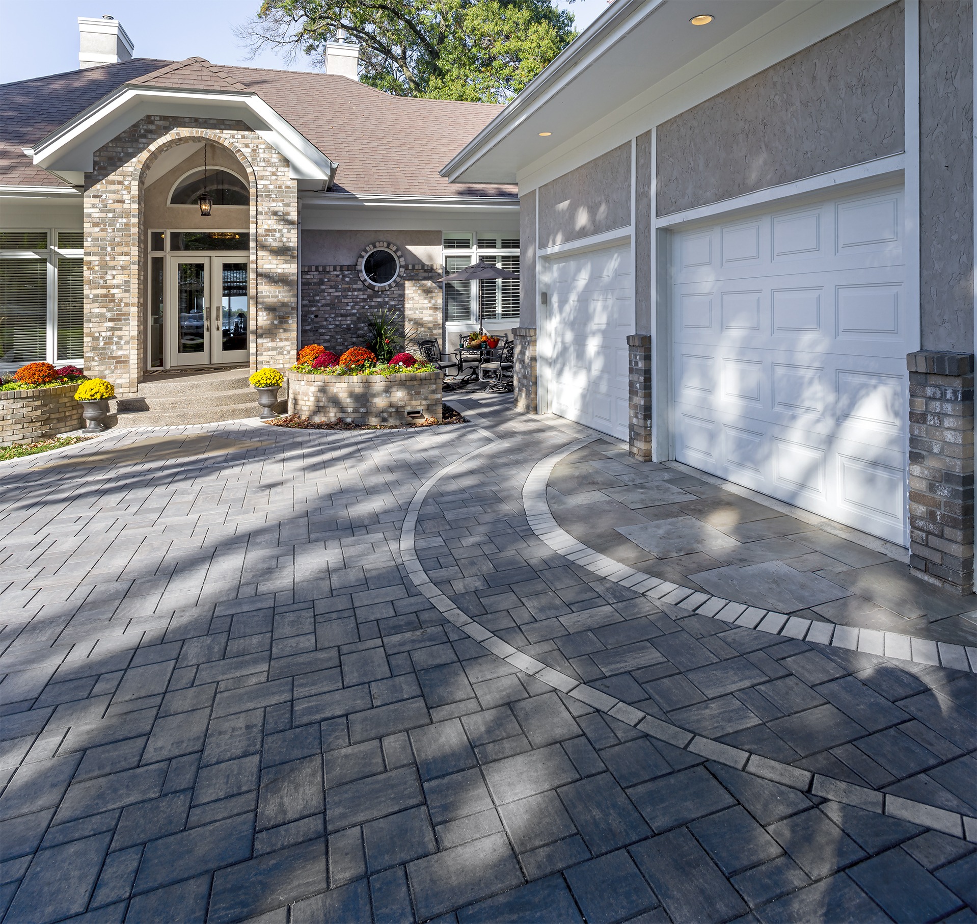 Elegant brick home with spacious driveway