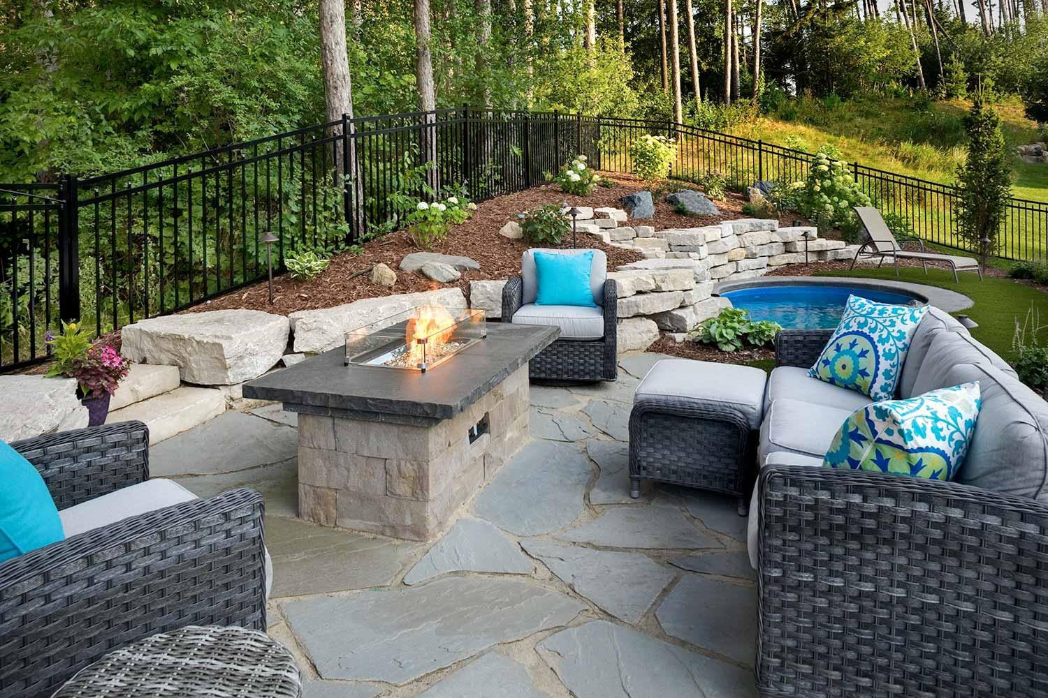 Cozy patio with firepit and pool