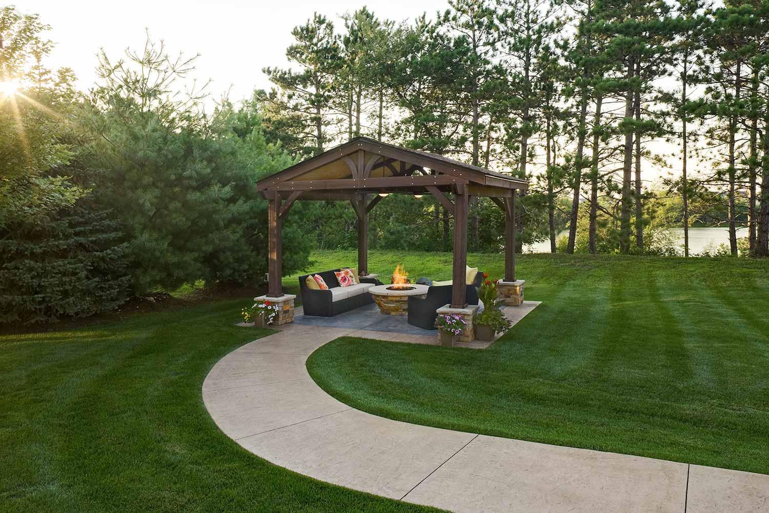 Detailed timber structure offers lakeside views and nights by the fire.