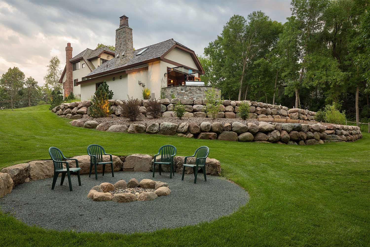 Backyard with fire pit and chairs