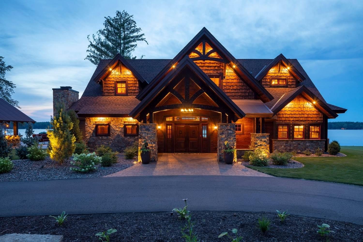 Charming cabin with lake view at dusk