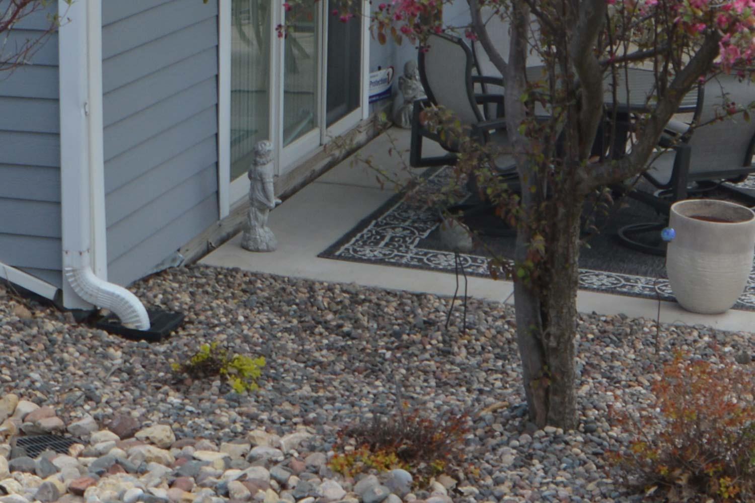 ​The new catch basin and drain tile move water quickly from the corner of the home to a pop-up at the edge of the property.