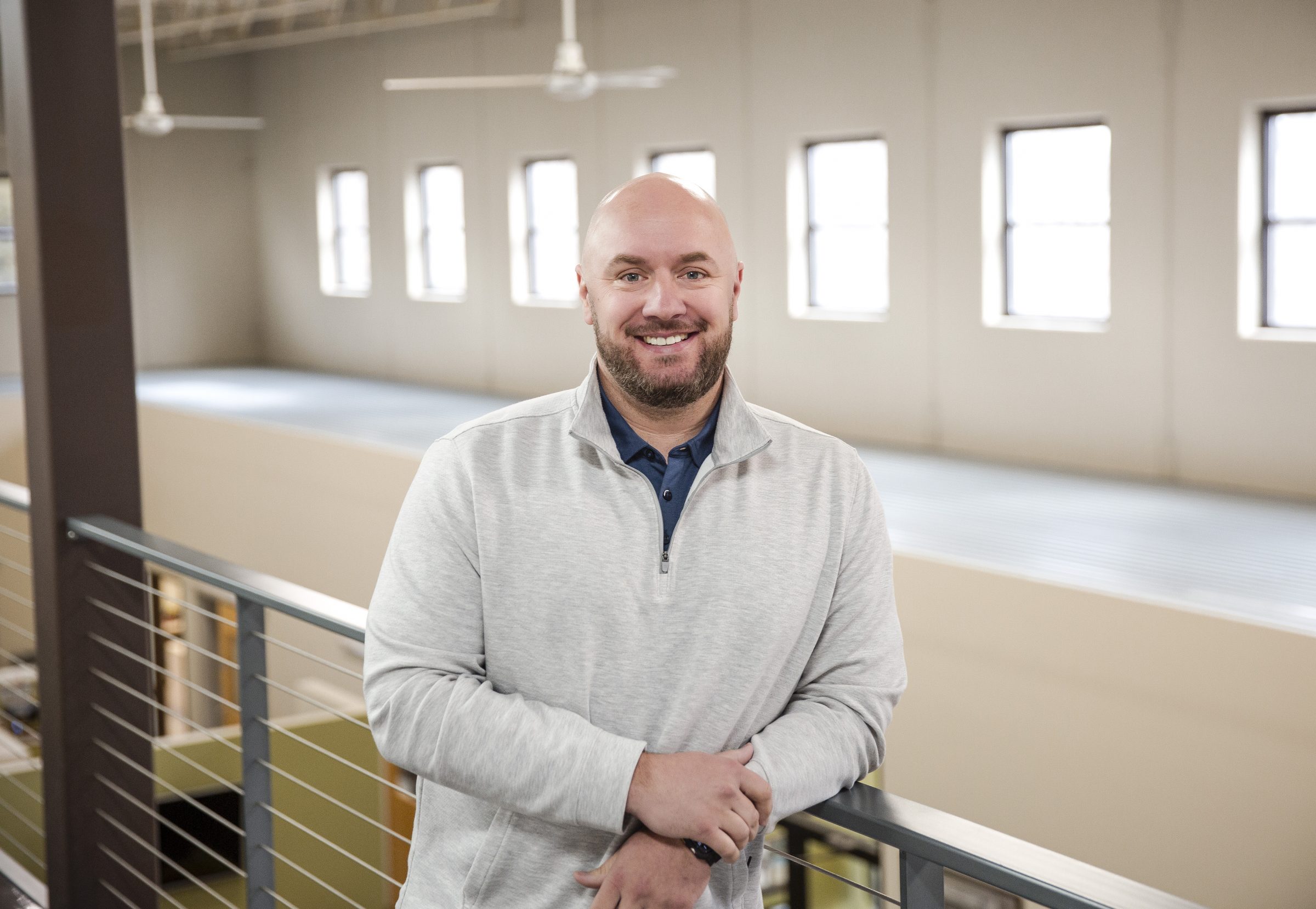 Smiling man in a modern office setting