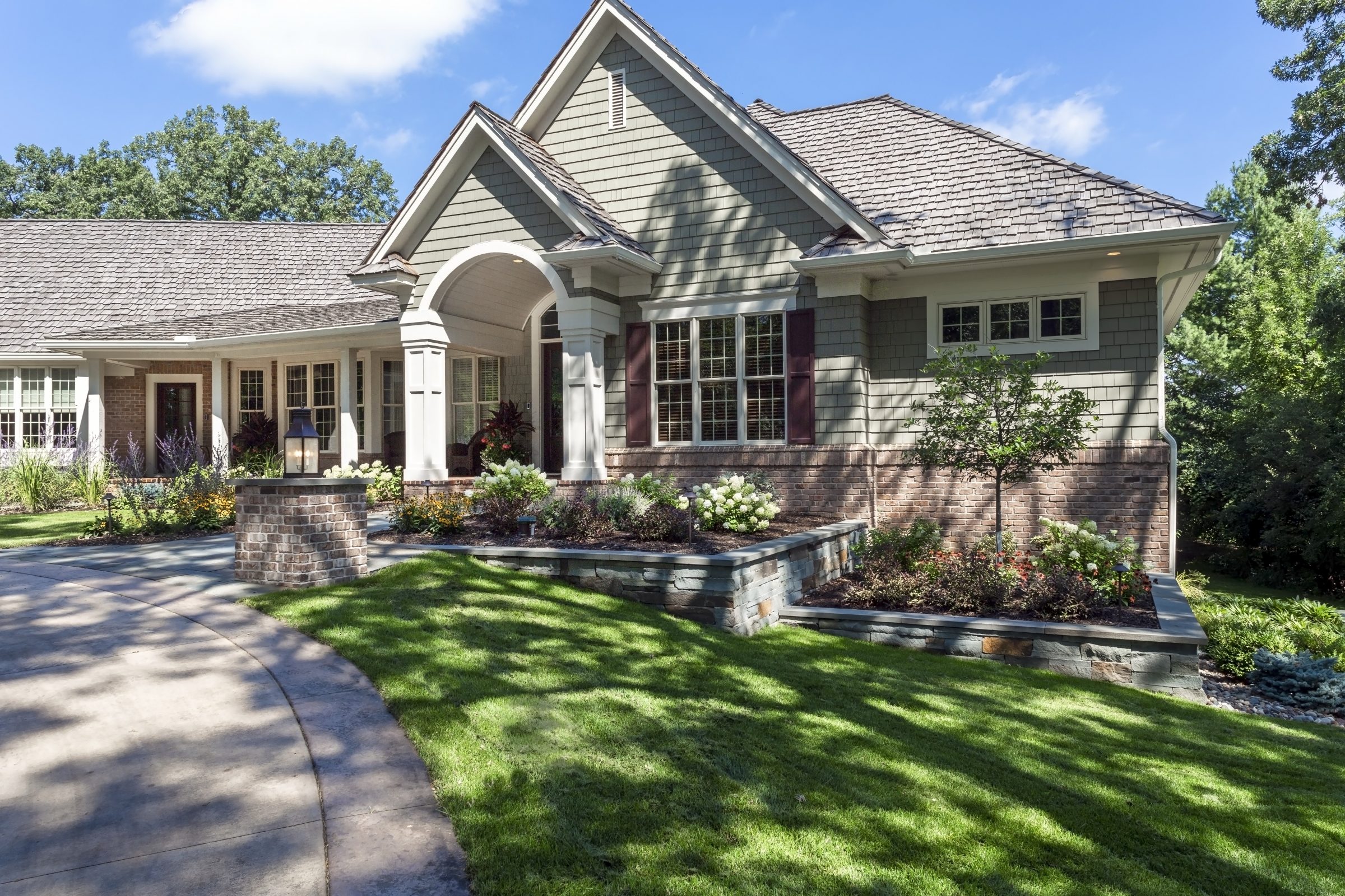 Beautiful suburban home with landscaped front yard.