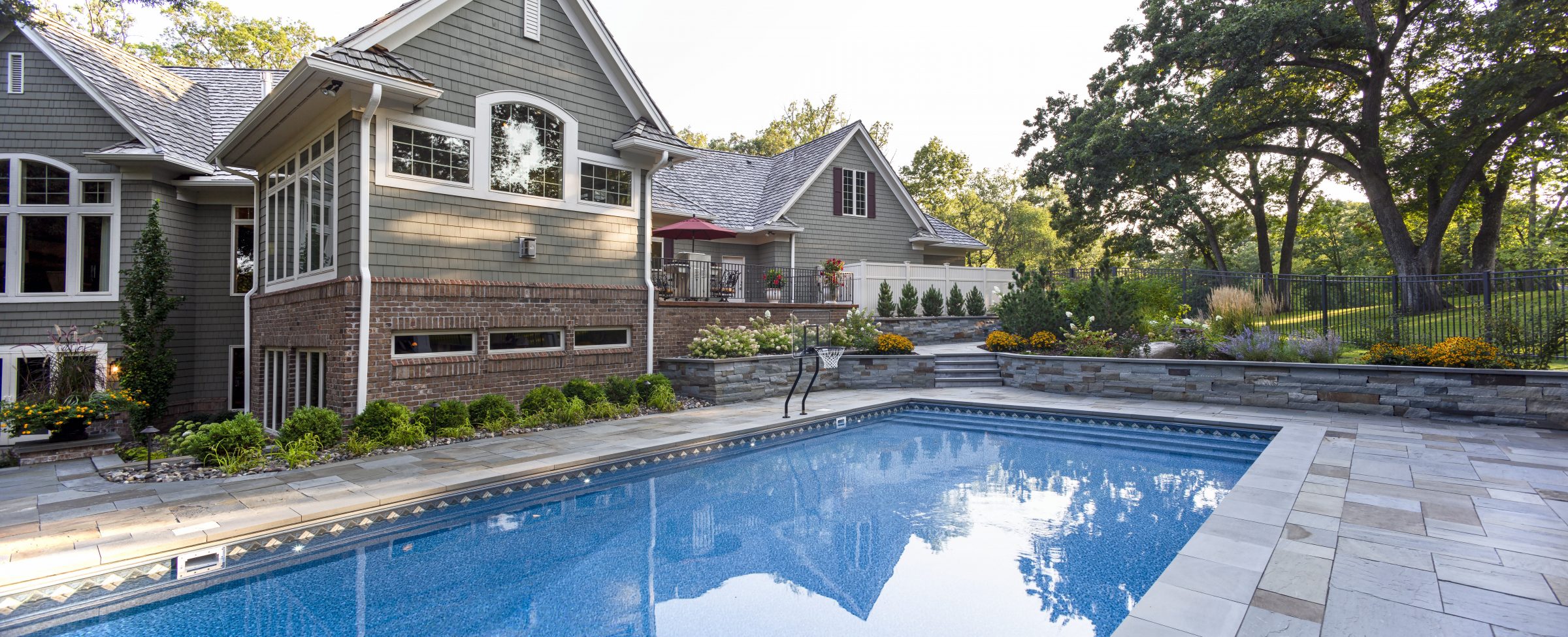 Backyard view with modern house and pool