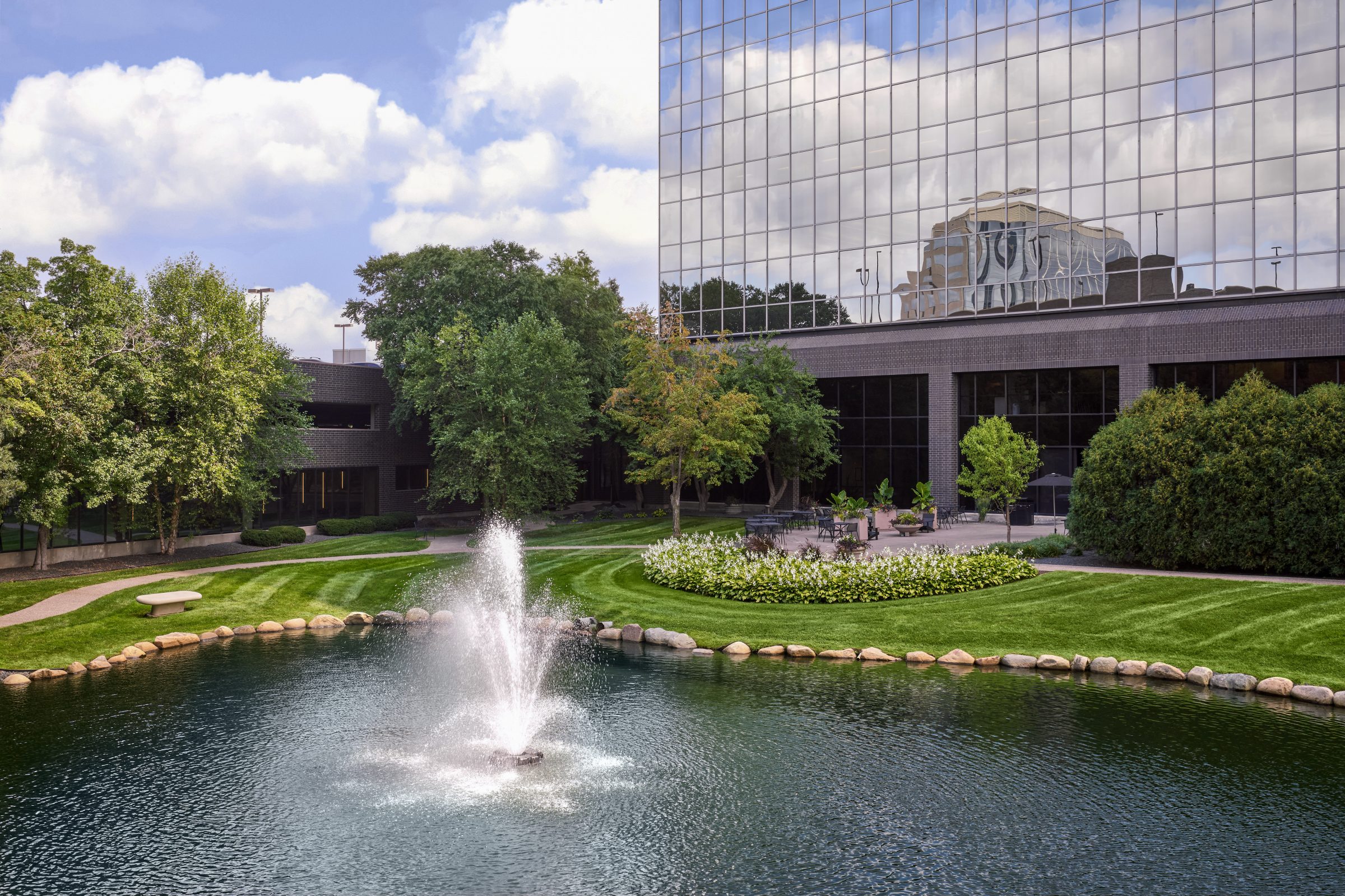 Fountain in a landscaped pond at Normandale Lakes Office Park in Bloomington, MN